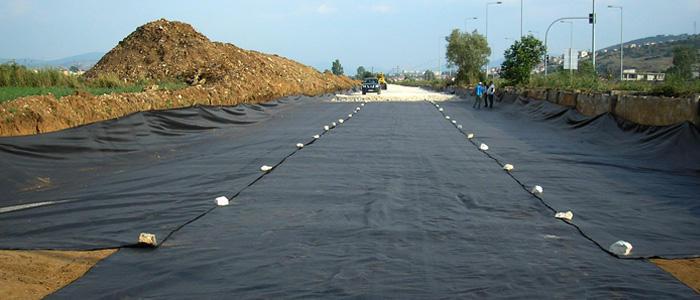 Installing high-strength reinforcement geotextile fabric